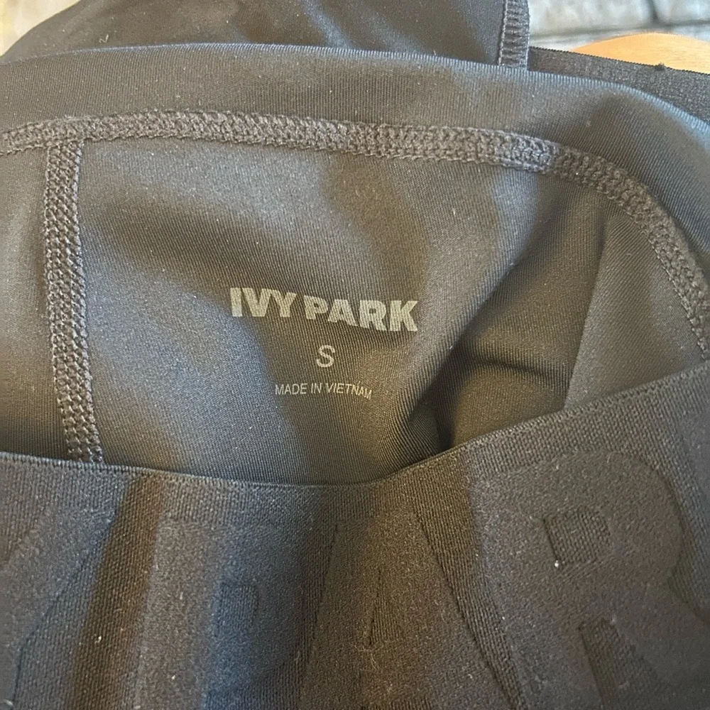 IVY PARK Leggings with Mesh and‎ Moto Detailing and Flip Belt Zipper Pocket